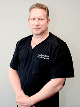 Dr. John R Miklos